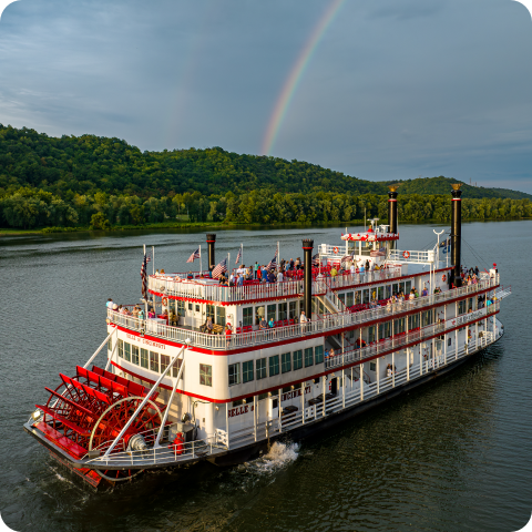 Summer cruise tour rainbow over the Ohio River