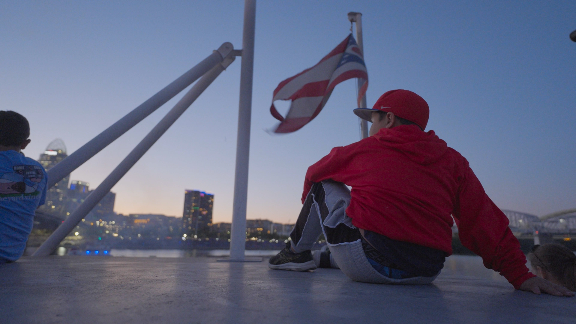 Adolecent enjoying the view of Cincinnati on a BB Riverboat